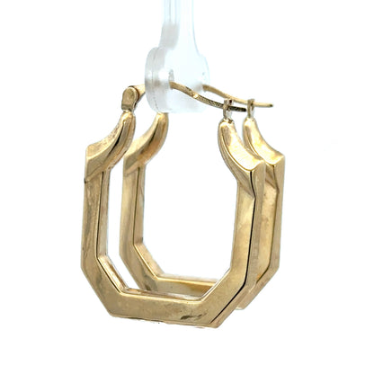 9ct yellow gold hoop earrings weighing 2.2g, stylish jewelry by Reeves and Sons, shown in a close-up image.