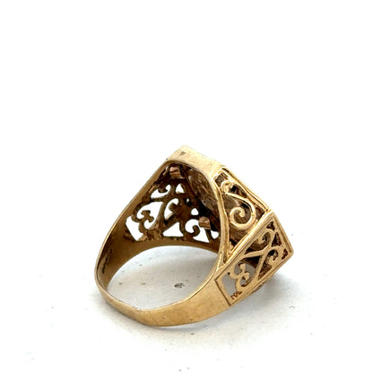 9ct yellow gold St George ring in size T, featuring detailed design, crafted by Reeves and Sons, shown on a plain background.