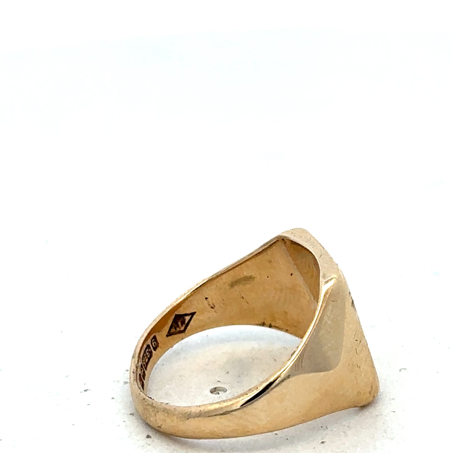 9ct yellow gold signet ring in size P1/2 from Reeves and Sons, featuring a polished smooth surface.