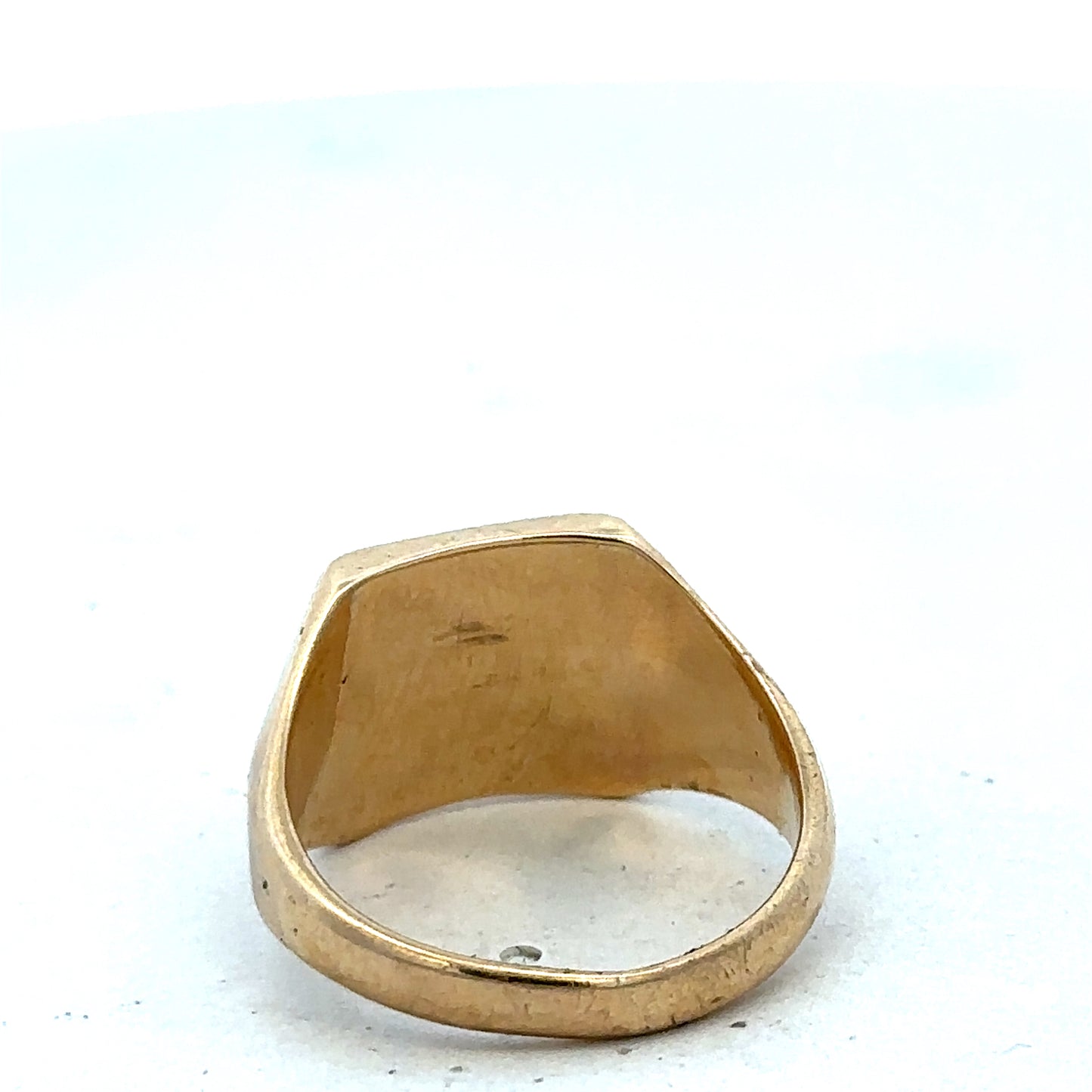 9ct yellow gold signet ring in size P1/2 with Reeves and Sons branding, showcasing a polished, classic design.