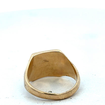 9ct yellow gold signet ring in size P1/2 with Reeves and Sons branding, showcasing a polished, classic design.