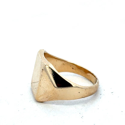 9ct yellow gold signet ring in size P1/2 by Reeves and Sons, showcasing a polished, classic design with smooth finish.