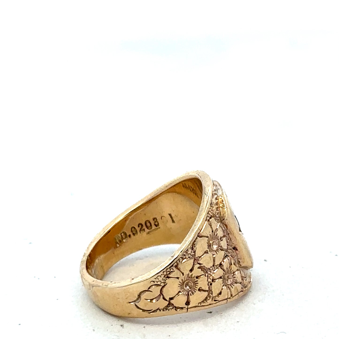 9ct yellow gold ring size L by Reeves and Sons, showcasing a polished smooth band on a neutral background.