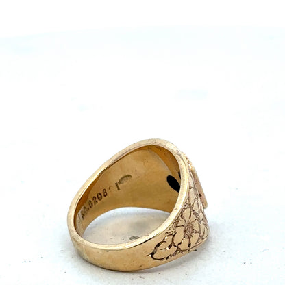 9ct yellow gold ring size L by Reeves and Sons, close-up of polished band with smooth finish.