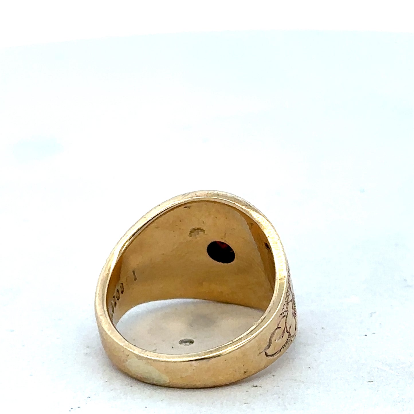 9ct yellow gold ring in size L with a smooth band, crafted by Reeves and Sons, displayed on a neutral background.