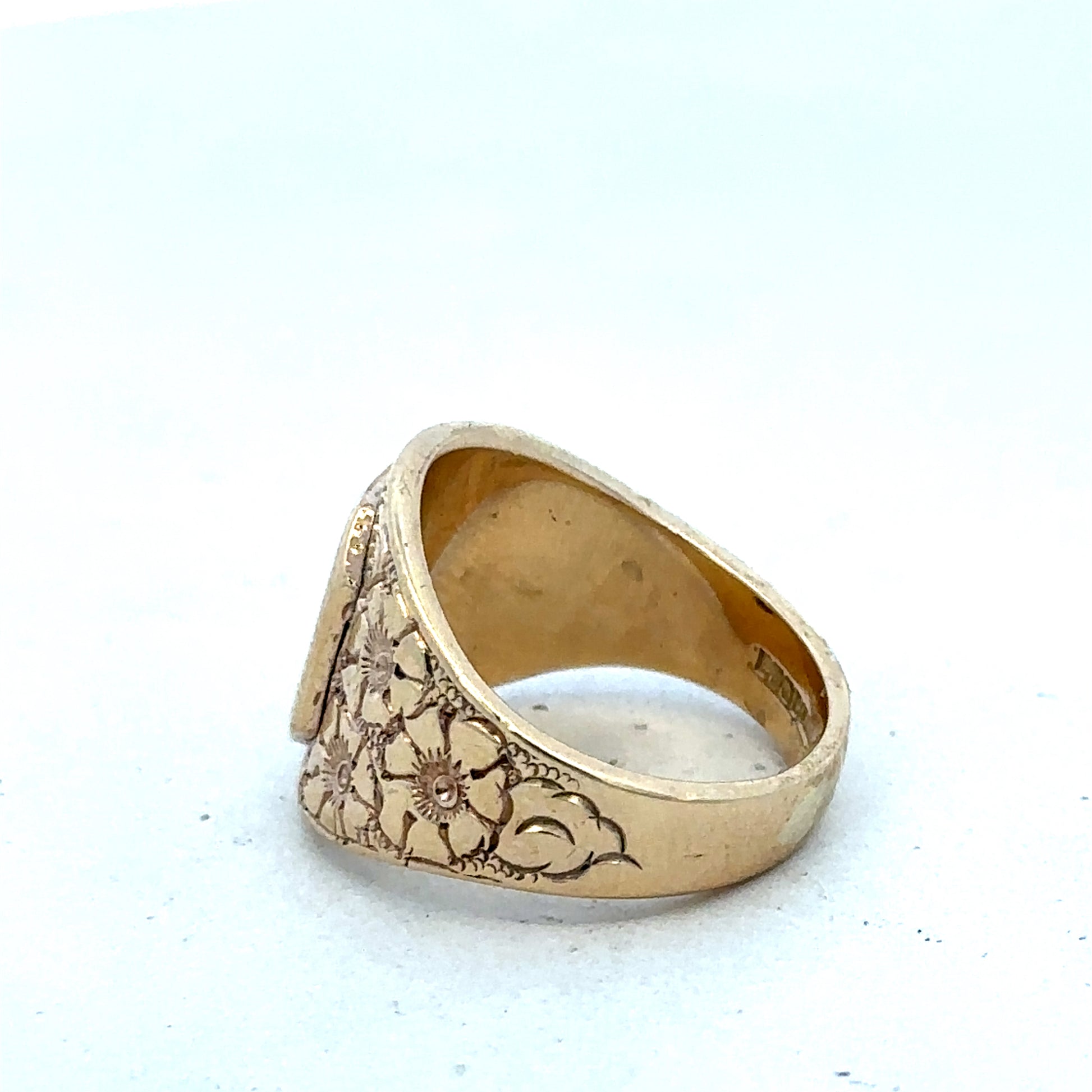 9ct yellow gold ring in size L by Reeves and Sons, featuring a smooth polished band.