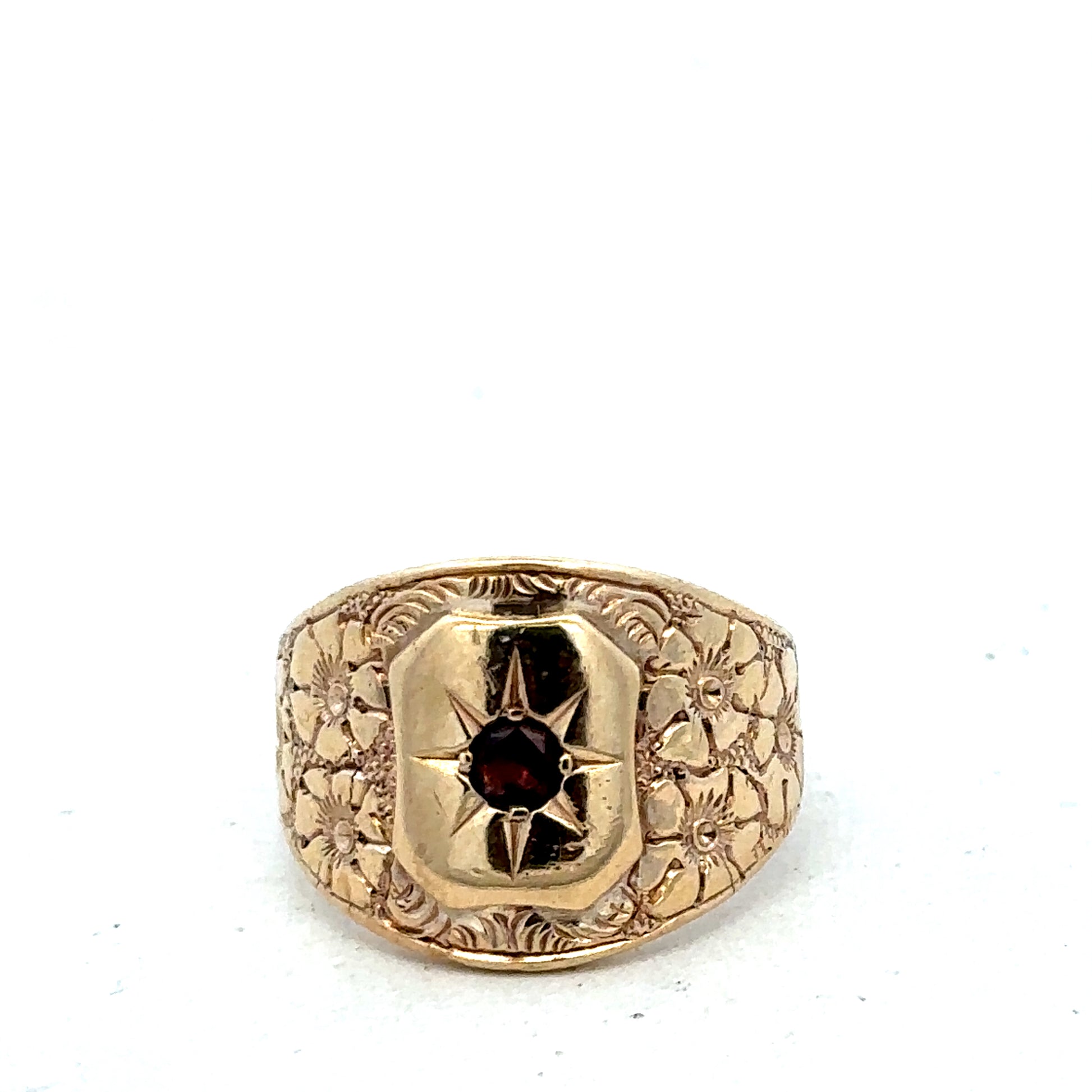 9ct yellow gold ring size L by Reeves and Sons, showcasing a smooth polished band in close-up view.