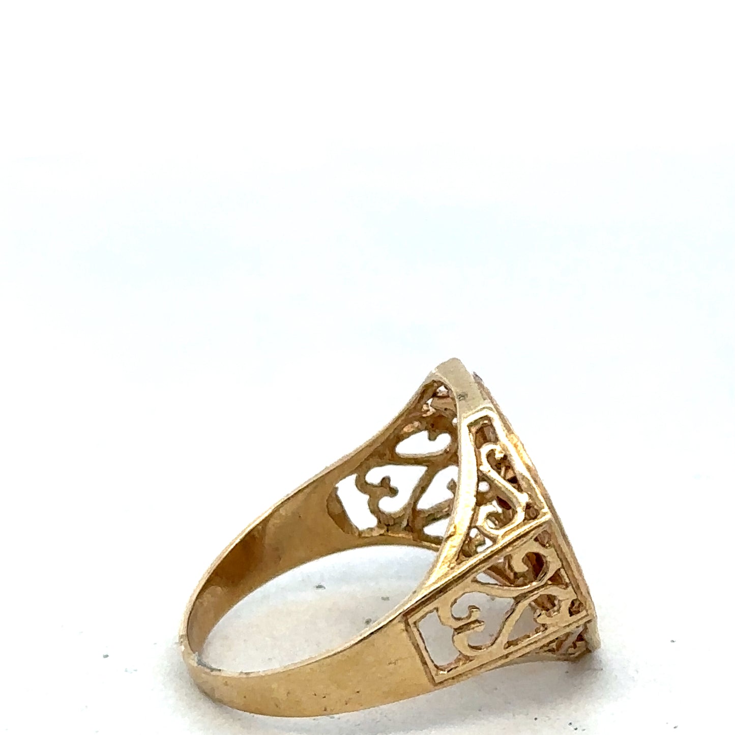 9ct yellow gold St George ring in size T with detailed engraved design, crafted by Reeves and Sons.