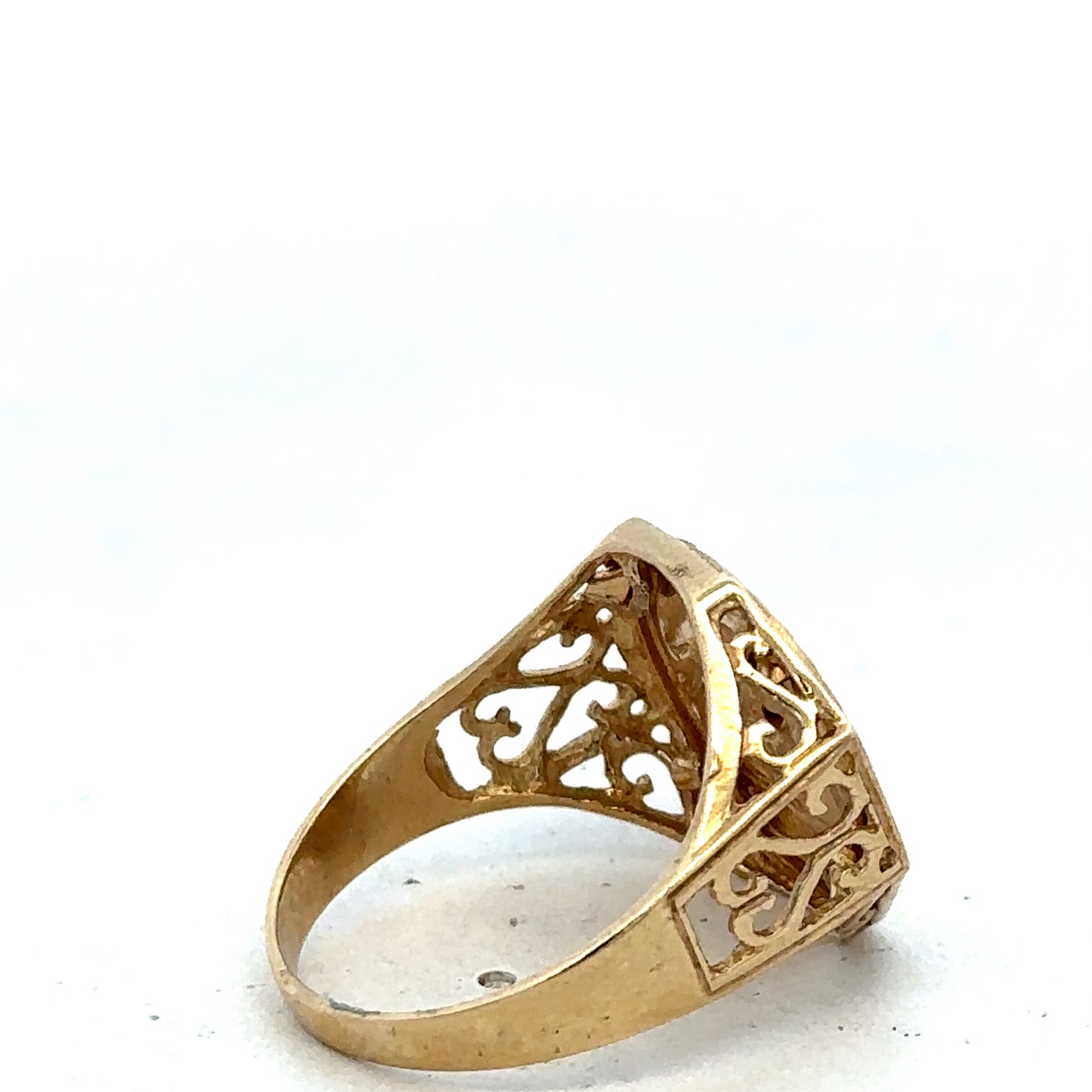 9ct yellow gold St George ring in size T, featuring detailed engravings and a polished finish, crafted by Reeves and Sons.