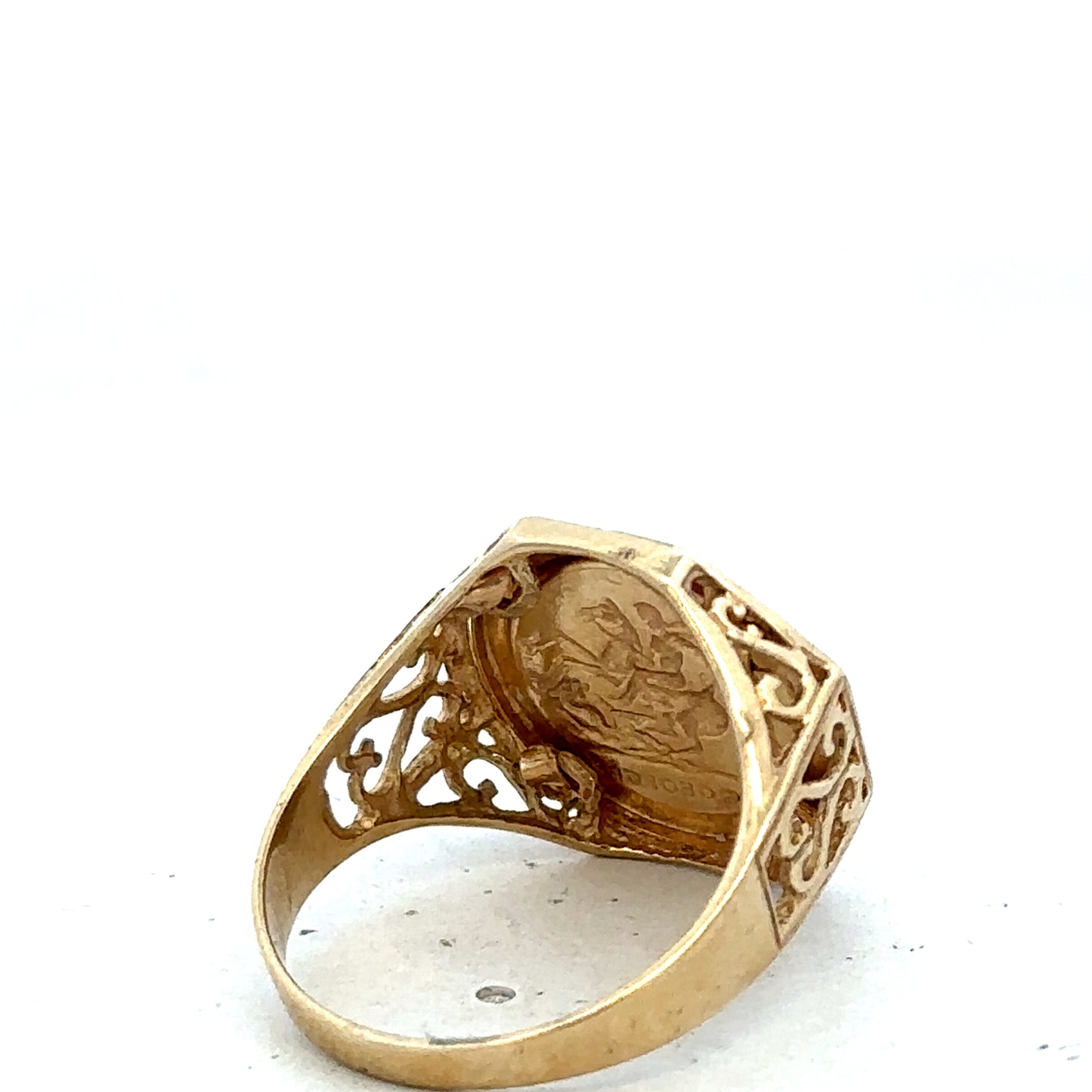 9ct yellow gold St George ring in size T with engraved design, featuring a polished finish and Reeves and Sons branding.