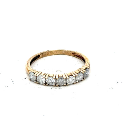 9ct Half Carat Diamond Eternity Ring by Carat, showcasing a band with sparkling diamonds set all around.