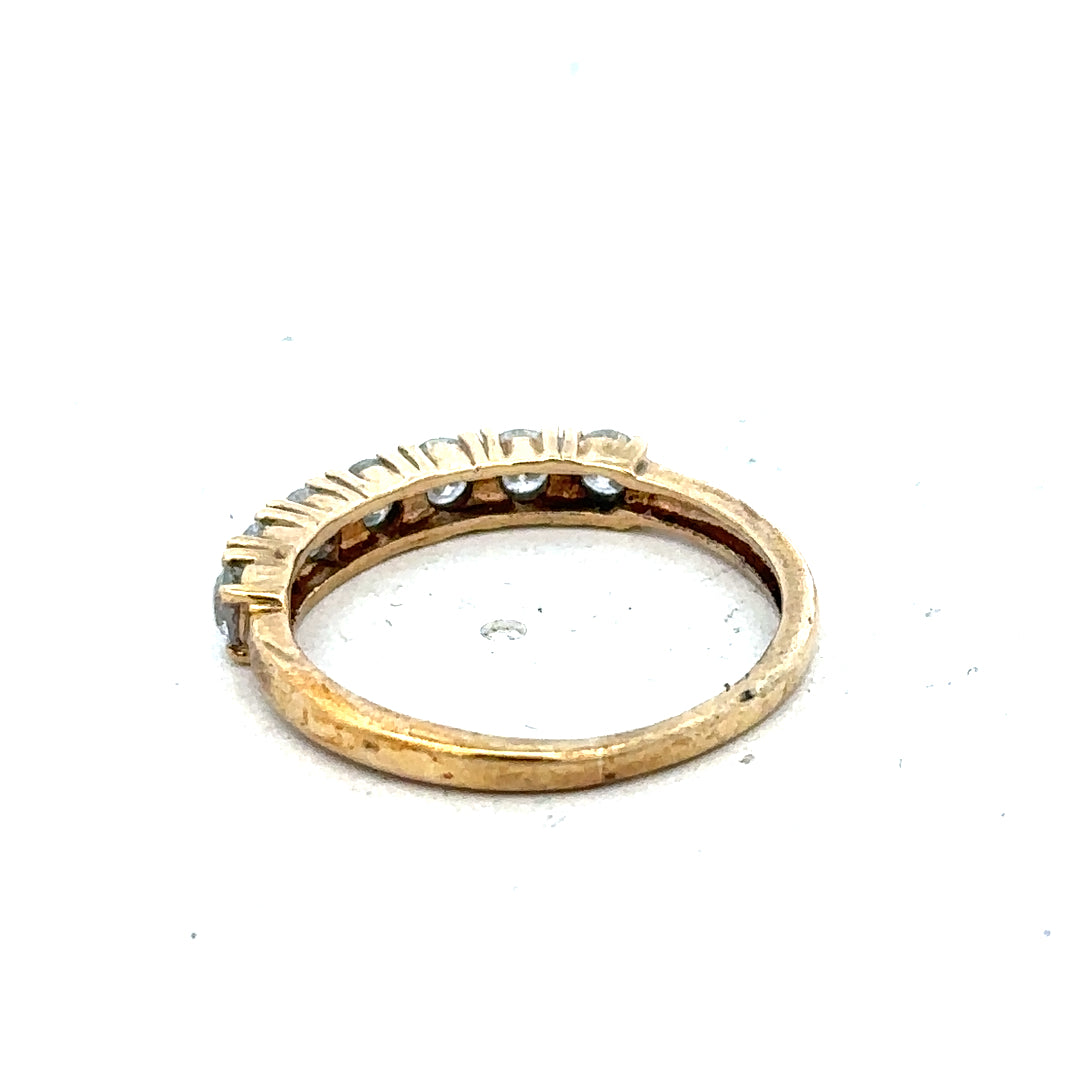 9ct half-carat diamond eternity ring by Carat, showcasing a continuous row of sparkling diamonds in a sleek band.