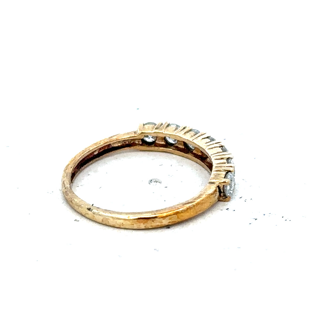 9ct half-carat diamond eternity ring by Carat, featuring a continuous row of sparkling diamonds on a sleek band.