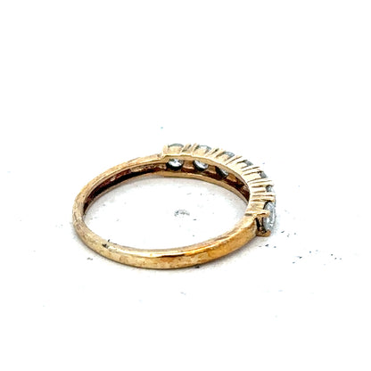 9ct half-carat diamond eternity ring by Carat, featuring a continuous row of sparkling diamonds on a sleek band.