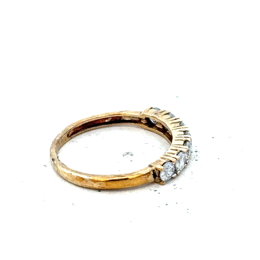 9ct half-carat diamond eternity ring by Carat featuring a continuous row of sparkling diamonds on a sleek band.