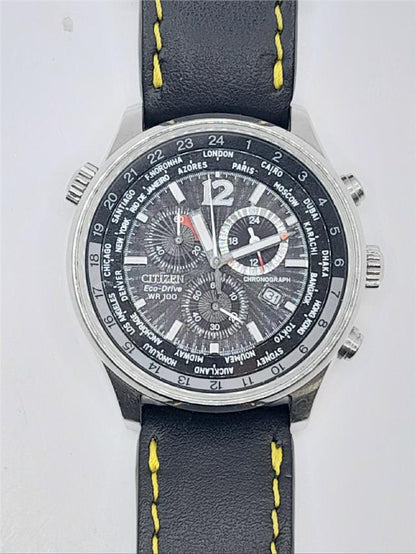 Citizen WR100 Eco-Drive watch model SH24922B with black dial and stainless steel band, displaying time and date.