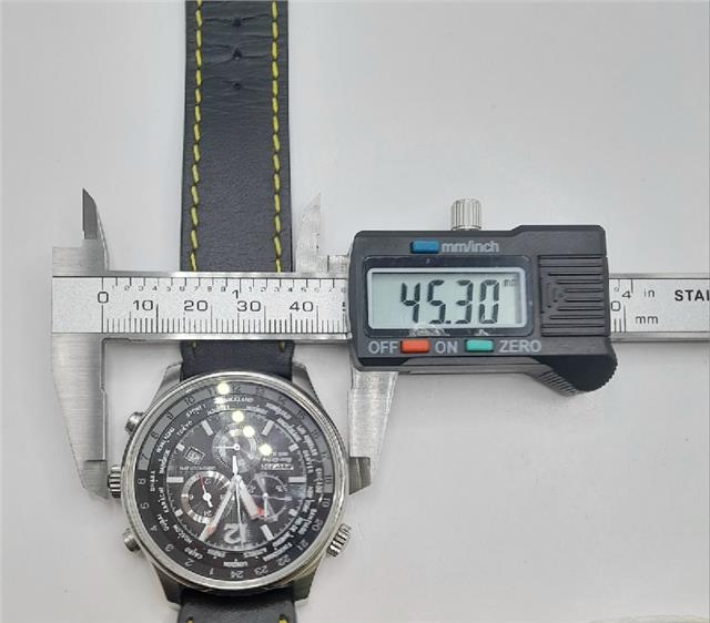 Citizen WR100 Eco-Drive watch SH24922B with black dial, stainless steel band, and water-resistant design.