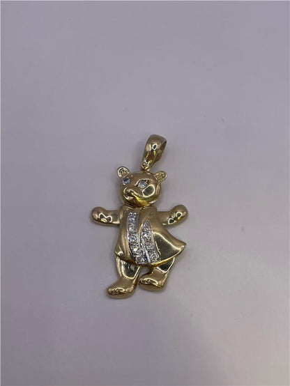9ct gold pendant weighing 8.9g, featuring a sleek design, displayed on a neutral background.