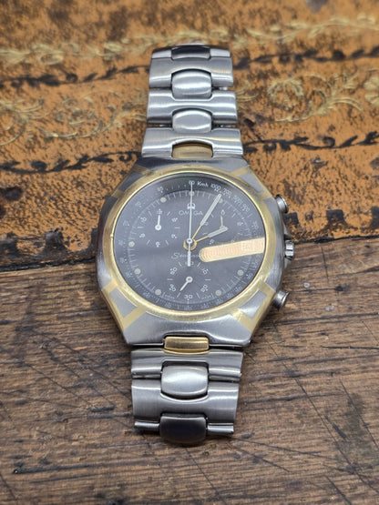 Omega Seamaster Polaris Chronograph watch with box and card, showcasing the stainless steel case and black dial.
