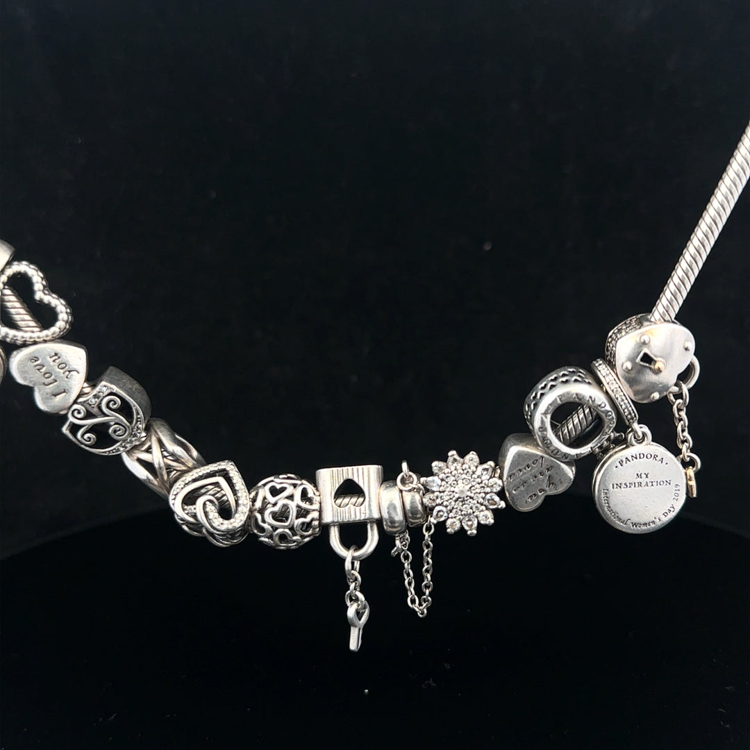 Pandora charm necklace 20-inch chain with intricate silver design, showcasing detailed craftsmanship and elegant style.