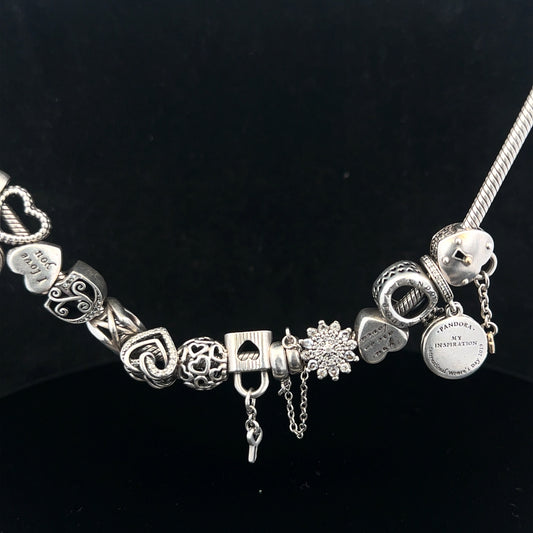 Pandora charm necklace 20-inch chain with intricate silver design, showcasing detailed craftsmanship and elegant style.