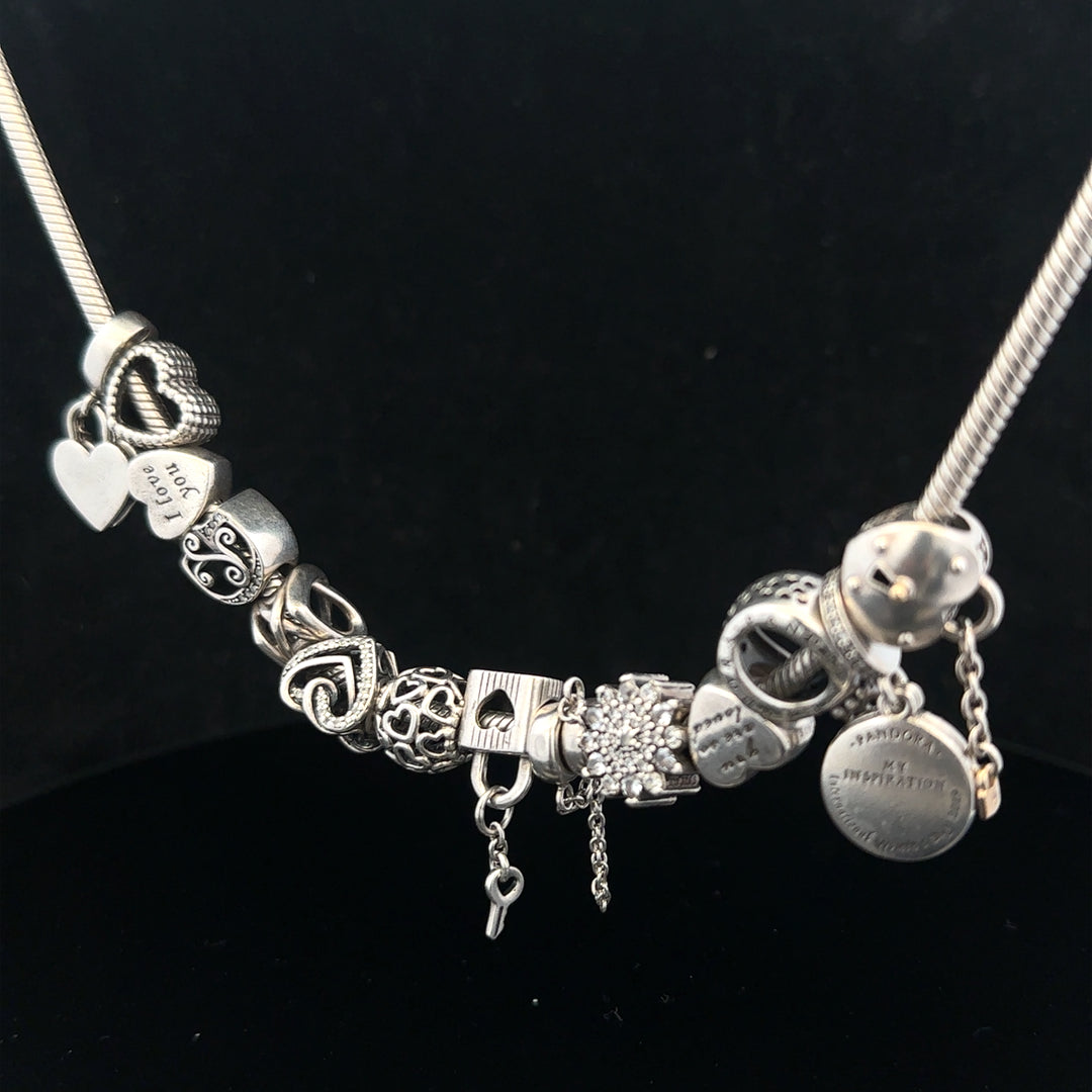Pandora 20-inch charm necklace chain in sterling silver with intricate design and adjustable length.
