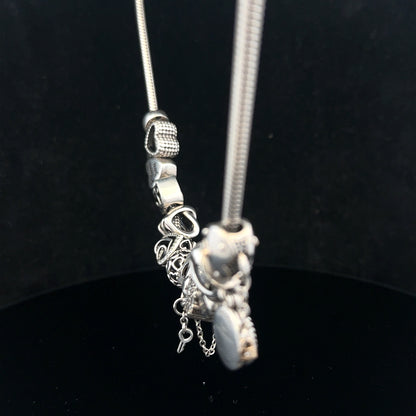 Pandora 20-inch charm necklace chain with intricate silver design, featuring a clasp and chain links.