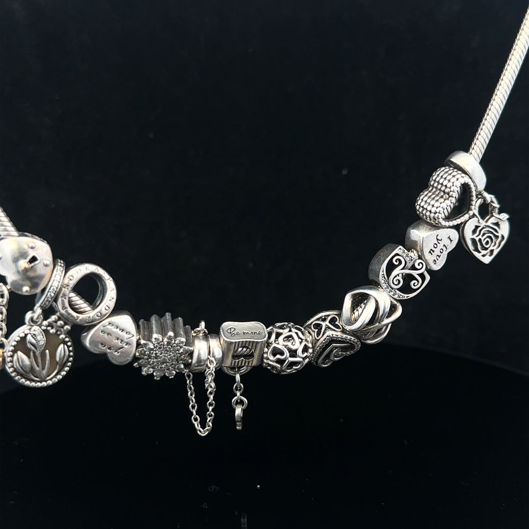 Pandora 20-inch chain necklace with charm, featuring a sleek silver design and detailed clasp, styled for elegant wear.