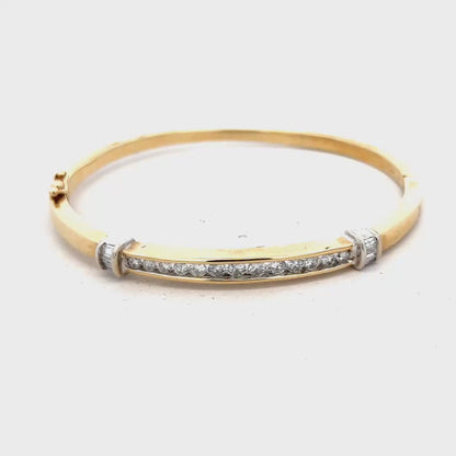 14ct yellow gold 1 carat diamond bangle, weight 17.5g (sh21966l)