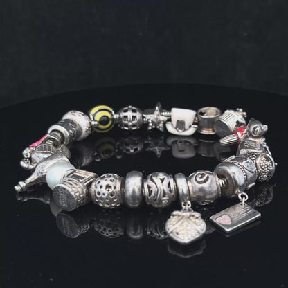 Silver charm bracelet 64.8
