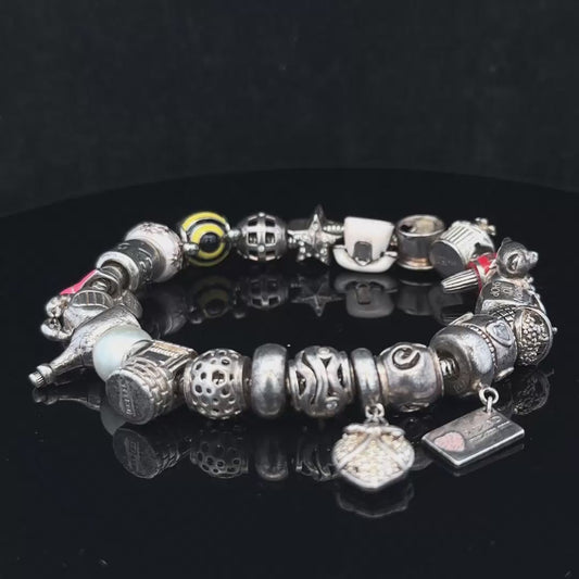 Silver charm bracelet 64.8