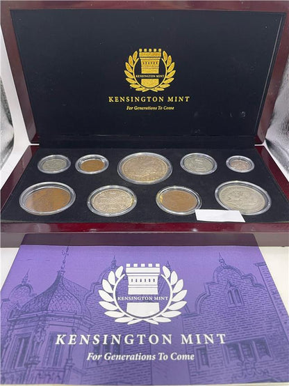 1935 silver Jubilee silver coin set by Reeves and Sons, featuring commemorative coins with intricate designs.