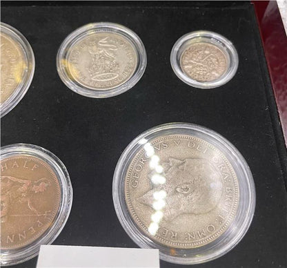 1935 silver Jubilee coin set by Reeves and Sons, featuring detailed silver coins in a collectible set.
