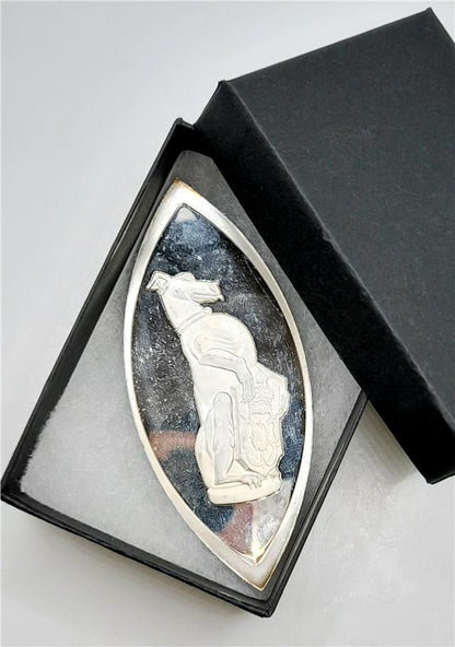 Reeves and Sons Queen's Beasts silver coin ingot with intricate design, shiny silver surface, and detailed engravings.