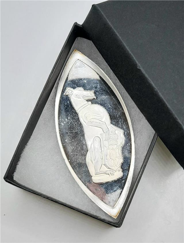 Silver coin from Reeves and Sons, The Queen's Beasts silver ingot with intricate design and detailed engravings.