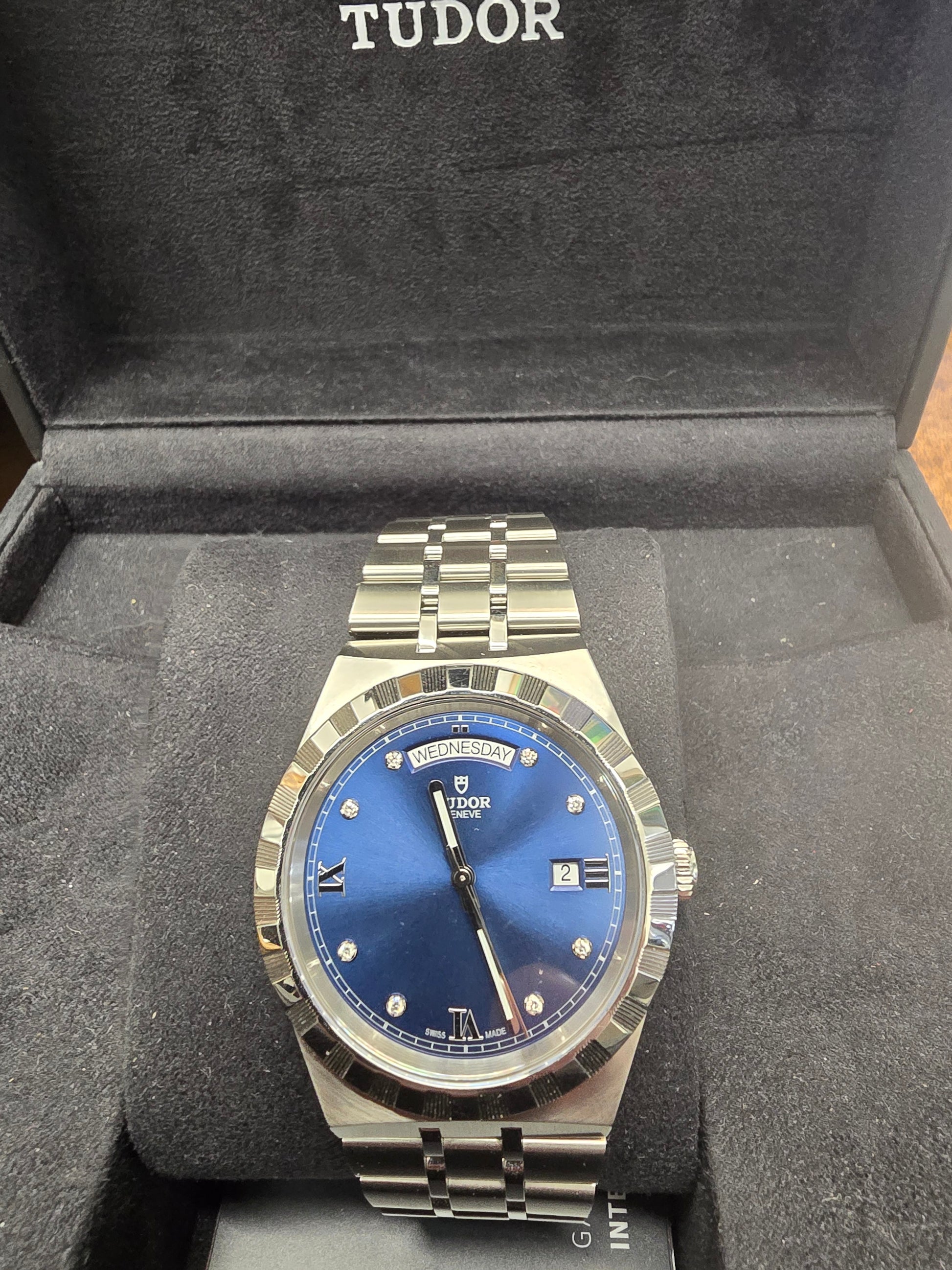Reeves and Sons Tutor Royal Day Date Diamond Watch Model 28600 with gold case and diamond accents, 2021 style.