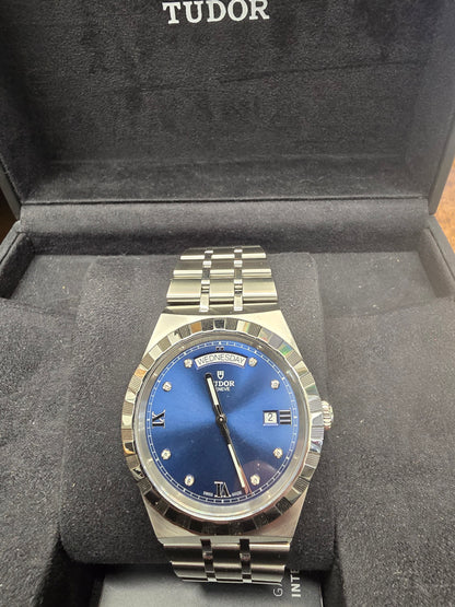 Reeves and Sons Tutor Royal Day Date Diamond Watch Model 28600 with gold case and diamond accents, 2021 style.