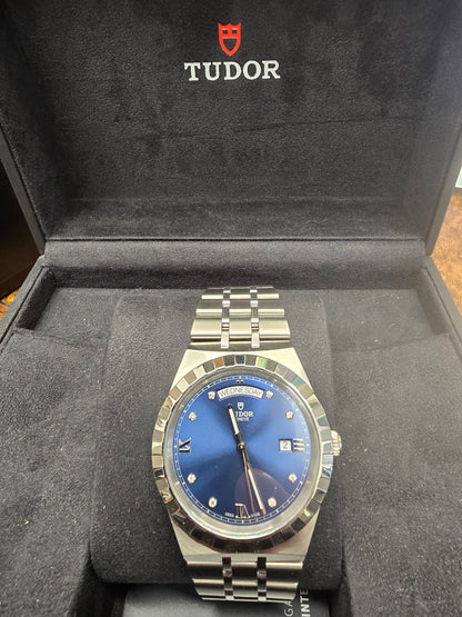 Reeves and Sons Tutor Royal Day Date Diamond Watch model 28600 with gold case and diamond accents, 2021.