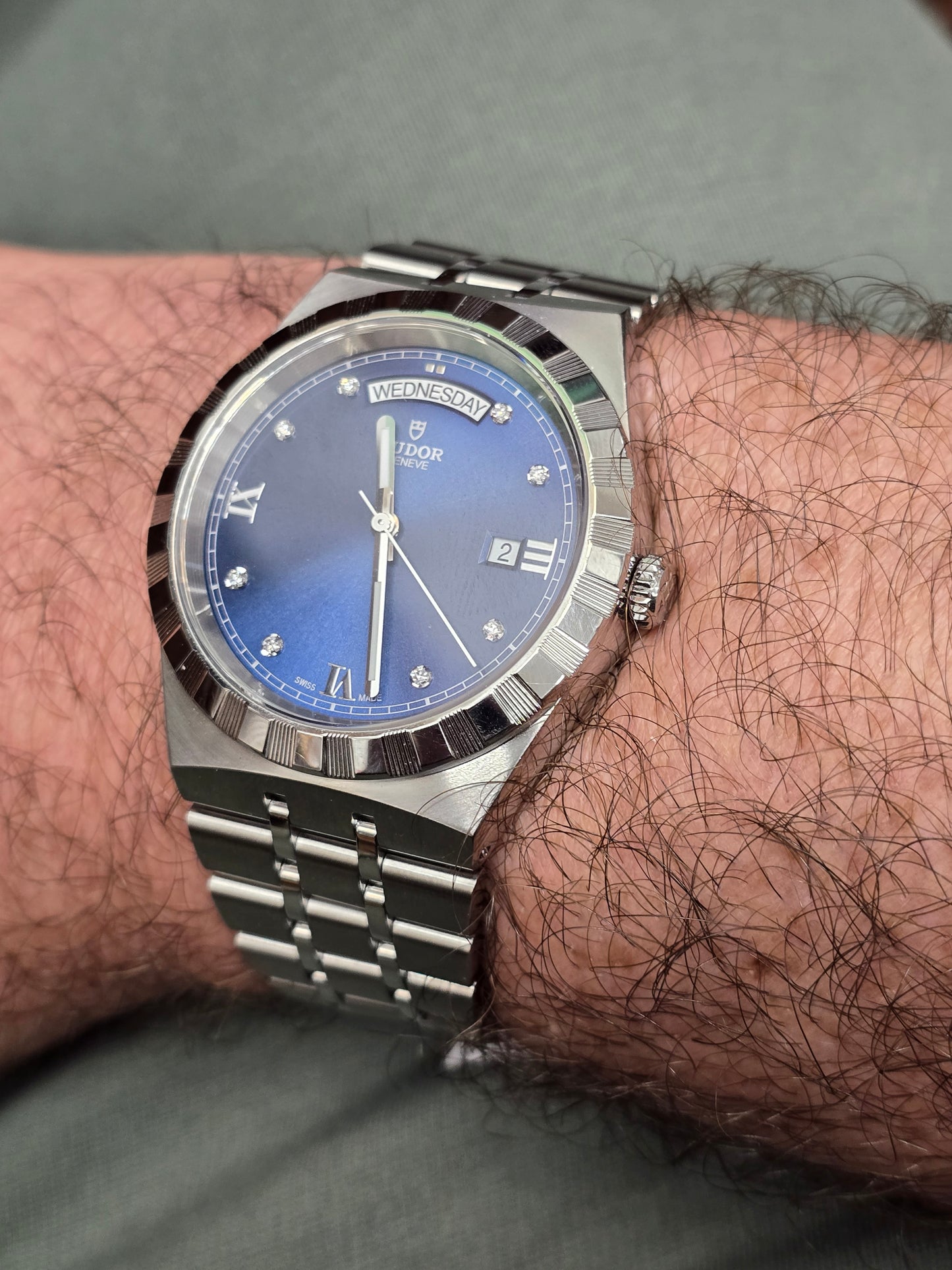 Reeves and Sons Tutor Royal Day Date Diamond Watch model 28600 with gold case and diamond accents, 2021 design.