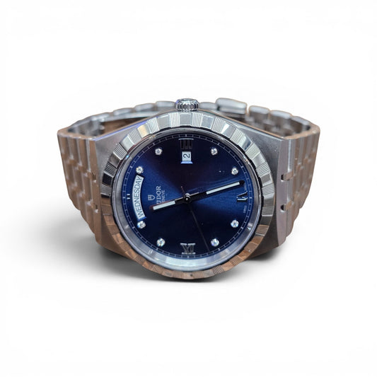 Reeves and Sons Tutor Royal Day Date Diamond Watch model 28600, silver dial with diamond accents, stainless steel bracelet, 2021.