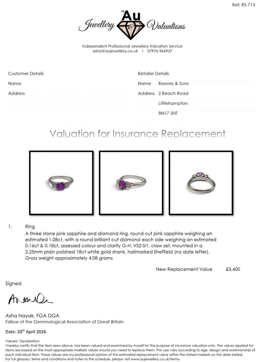 18ct white gold pink sapphire and diamond ring by Reeves and Sons, featuring a central pink sapphire with diamond accents.