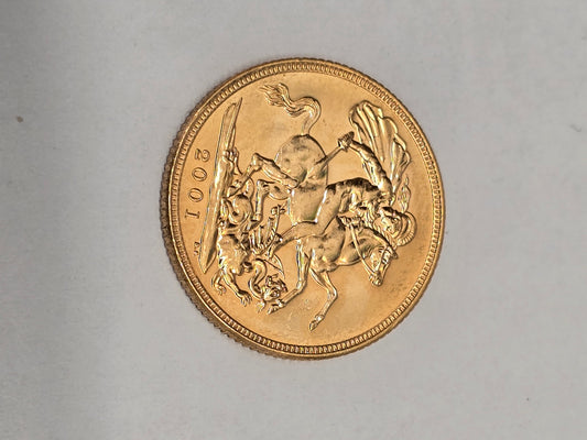 2001 Reeves and Sons full sovereign coin with detailed portrait and inscriptions, showcasing its classic gold design.