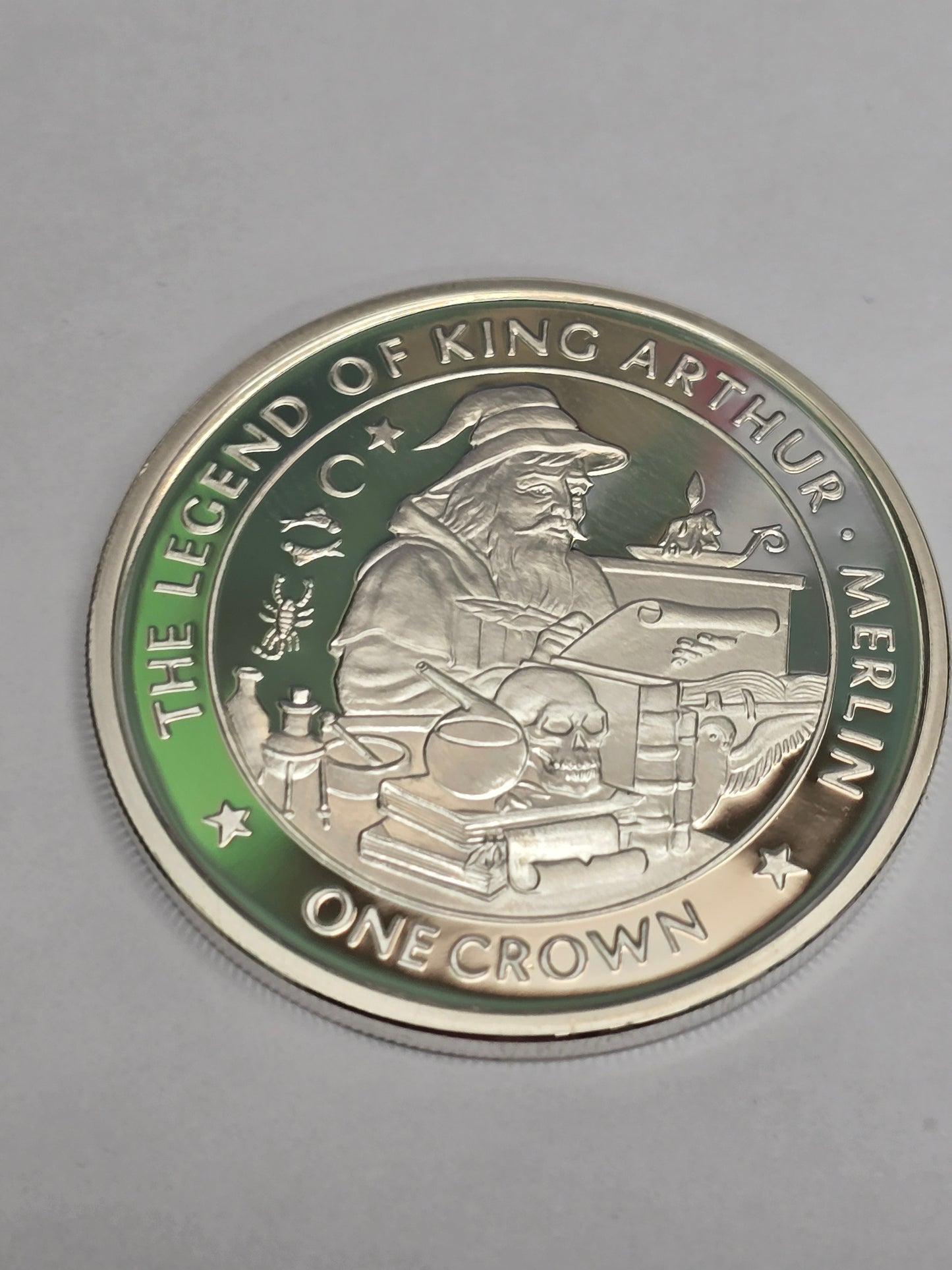 Silver King Arthur coin featuring a crown design, from Reeves and Sons, showcasing detailed medieval imagery and classic craftsmanship.