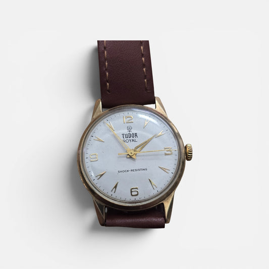 9ct yellow gold Tudor Royal watch with brown leather strap, elegant timepiece from Reeves and Sons.
