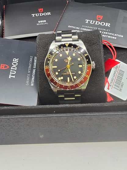 Tudor Black Bay 58 GMT Coke full set watch from 2024 with black and red bezel, stainless steel bracelet, and detailed dial.
