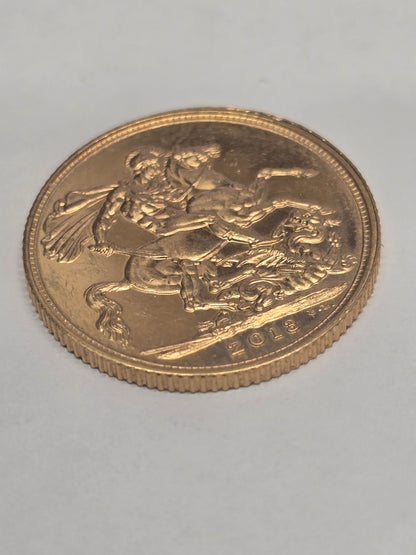 2012 Reeves and Sons full sovereign coin with detailed design and classic gold finish, showcasing historical coin craftsmanship.
