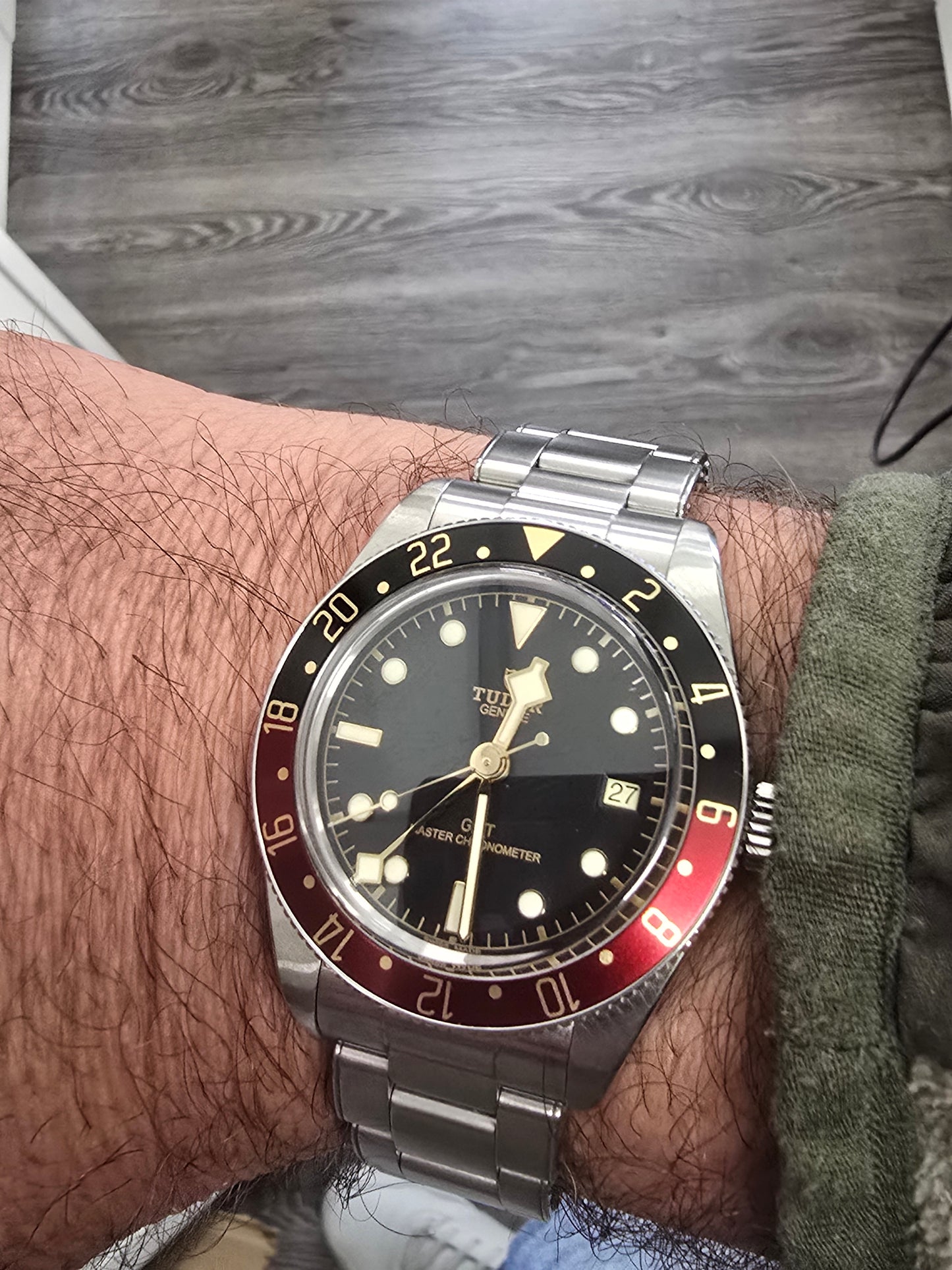 Tudor Black Bay 58 GMT Coke fullset watch with black and red bezel, stainless steel case, and black dial, 2024 model.