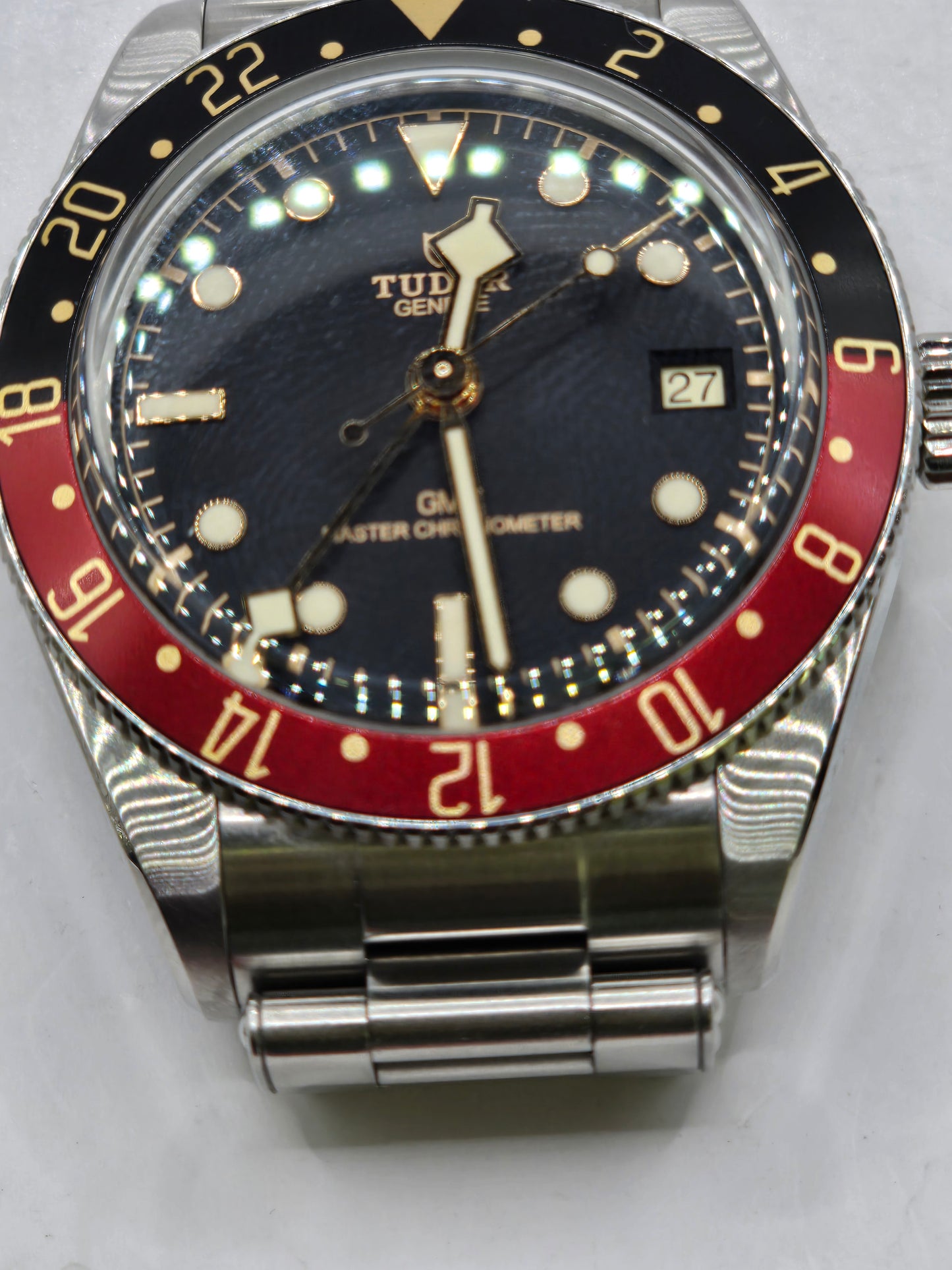 Reeves and Sons Tudor Black Bay 58 GMT Coke fullset watch from 2024, featuring a black and red bezel and stainless steel bracelet.