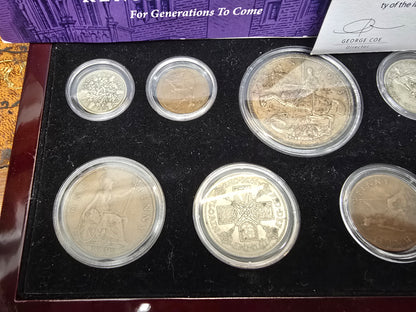 Reeves and Sons Kensington Mint 1935 Silver Jubilee silver coin set with box and certificate, showcasing detailed commemorative design.