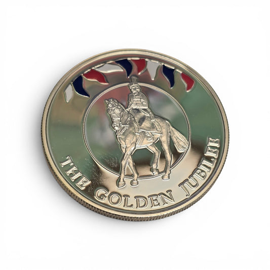 Silver 50 pence Golden Jubilee coin from 2002 by Reeves and Sons, showing intricate Jubilee design on the coin's surface.